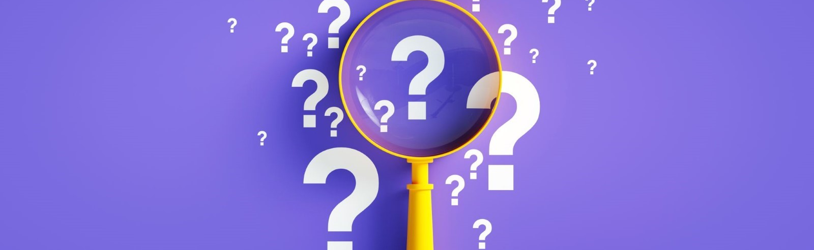 Magnifying glass and question mark